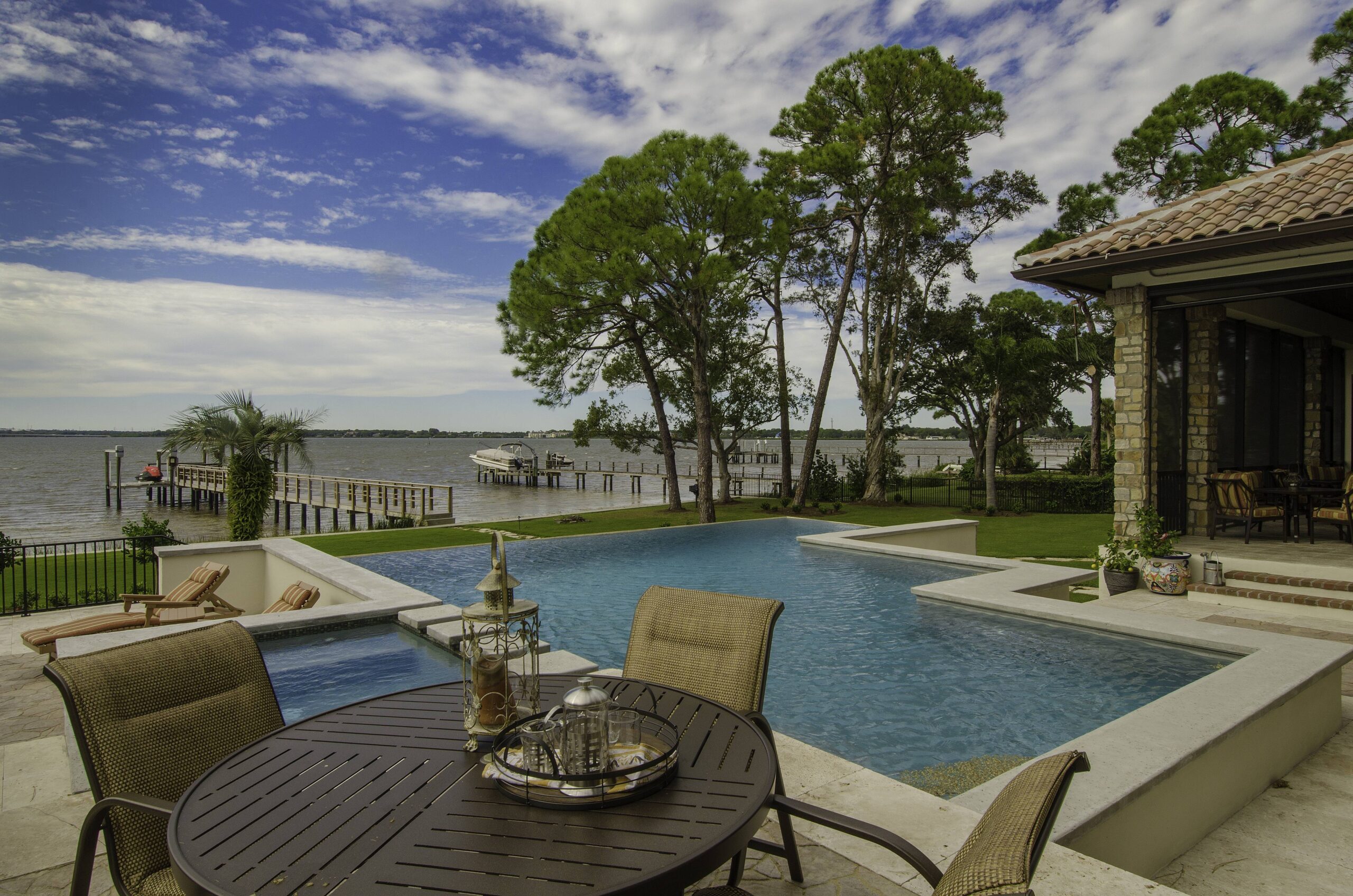 luxurious backyard with a pool and outdoor seating
